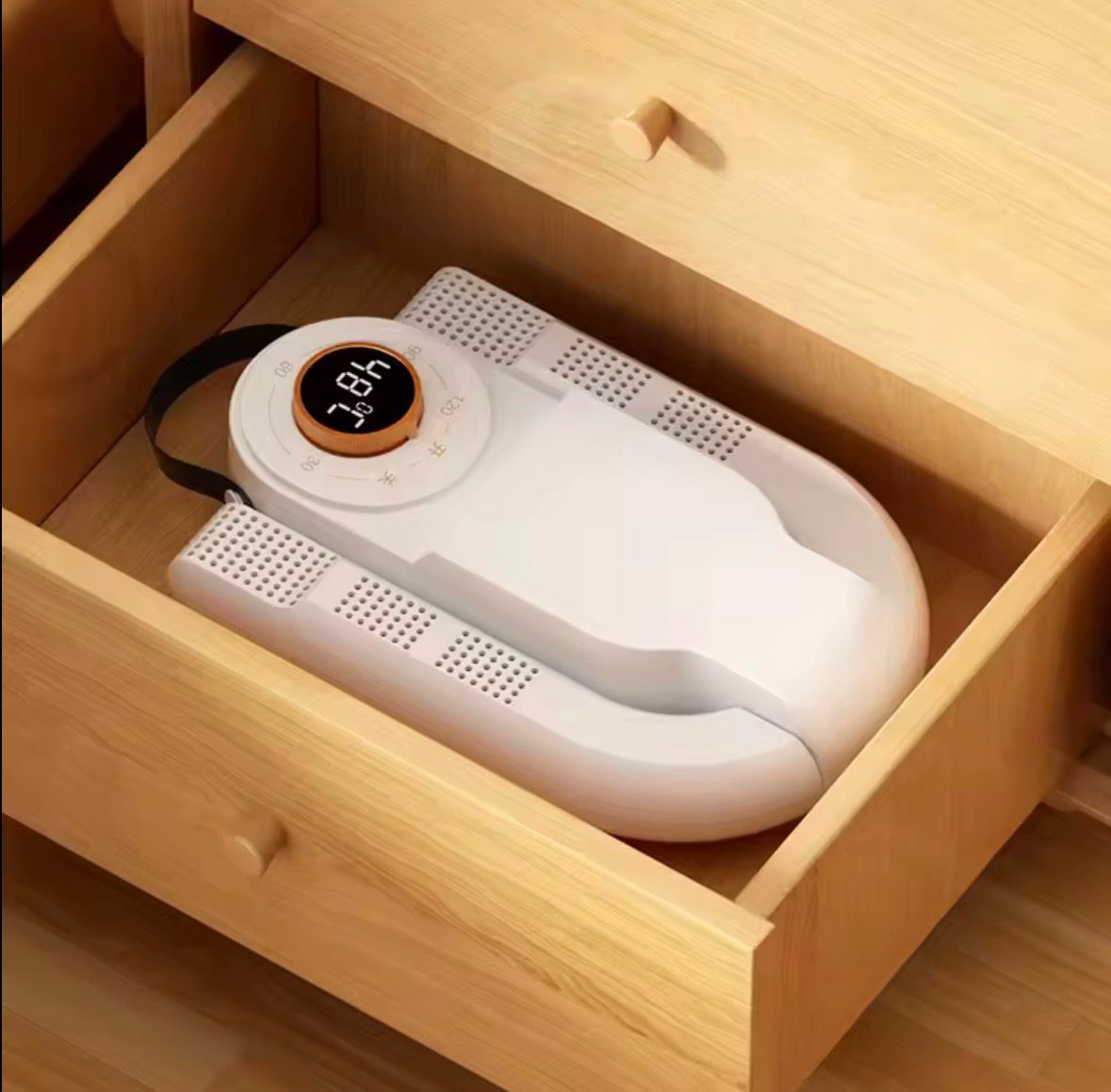 Prenosivi sušač za obuću